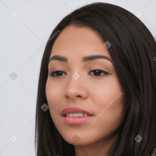 Joyful white young-adult female with long  black hair and brown eyes