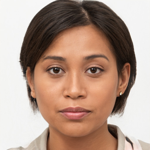 Joyful white young-adult female with medium  brown hair and brown eyes