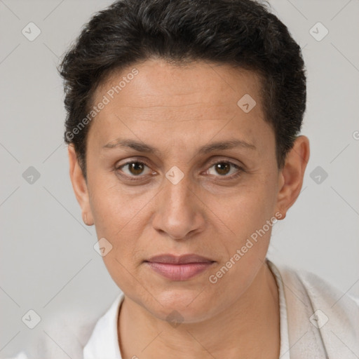 Joyful white adult female with short  brown hair and brown eyes