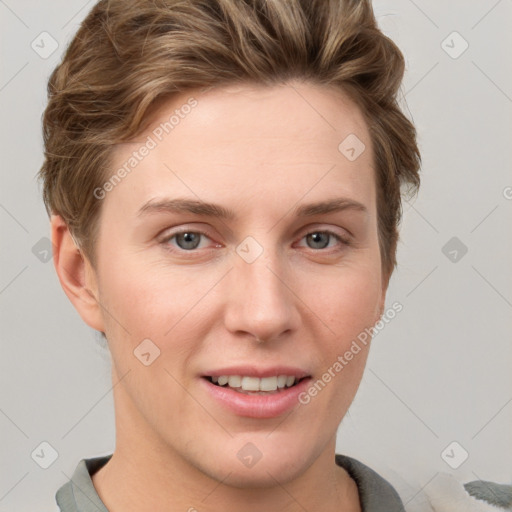 Joyful white young-adult female with short  brown hair and grey eyes