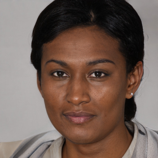 Neutral black young-adult female with medium  black hair and brown eyes