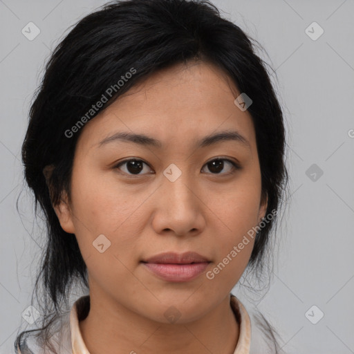 Joyful asian young-adult female with medium  brown hair and brown eyes