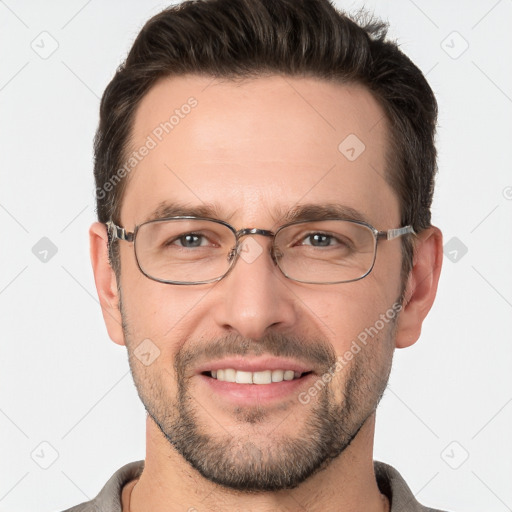 Joyful white adult male with short  brown hair and grey eyes