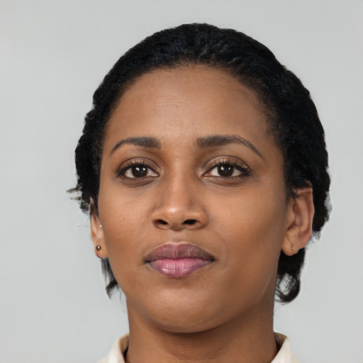 Neutral black young-adult female with short  black hair and brown eyes