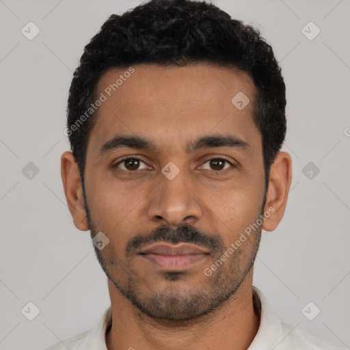 Neutral latino young-adult male with short  black hair and brown eyes