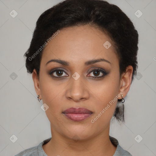 Joyful latino young-adult female with short  brown hair and brown eyes