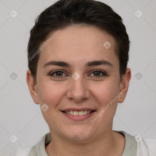 Joyful white young-adult female with short  brown hair and grey eyes