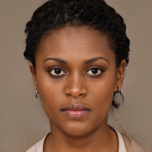 Neutral black young-adult female with short  black hair and brown eyes