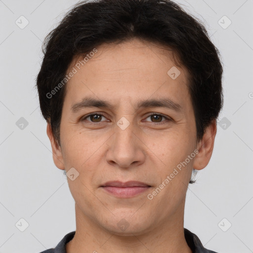 Joyful white adult male with short  brown hair and brown eyes