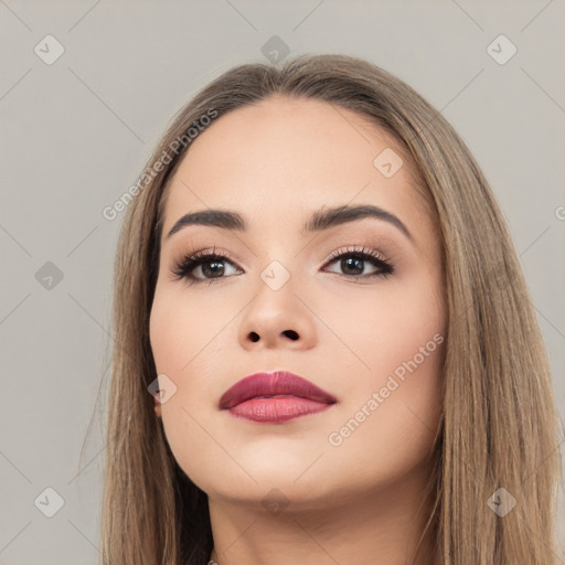 Neutral white young-adult female with long  brown hair and brown eyes