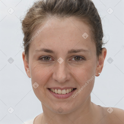 Joyful white adult female with short  brown hair and brown eyes