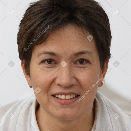 Joyful white adult female with short  brown hair and brown eyes