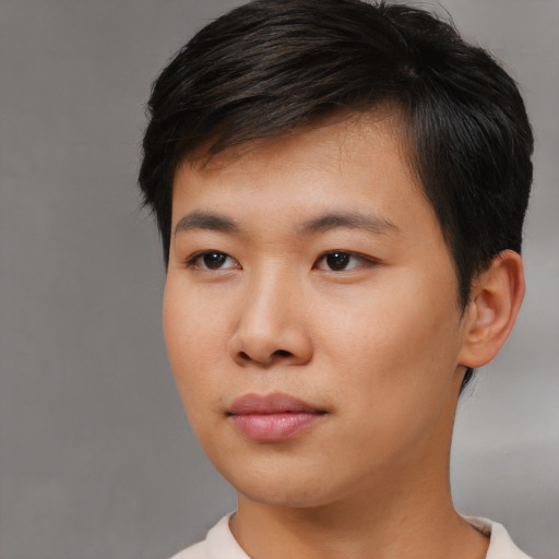 Neutral asian young-adult male with short  brown hair and brown eyes