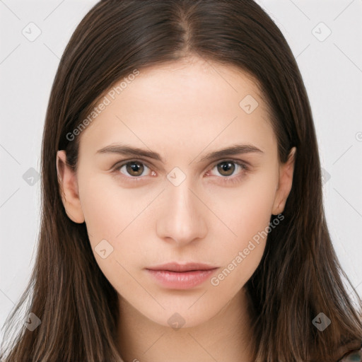 Neutral white young-adult female with long  brown hair and brown eyes