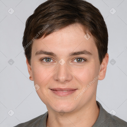 Joyful white young-adult female with short  brown hair and grey eyes