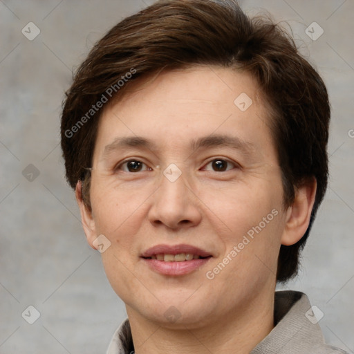 Joyful white adult female with short  brown hair and brown eyes