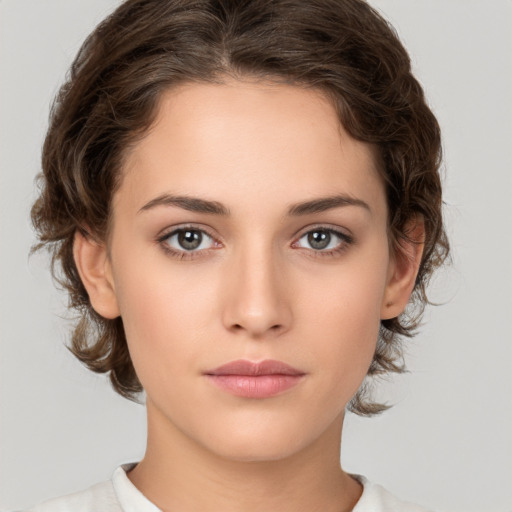 Neutral white young-adult female with medium  brown hair and brown eyes