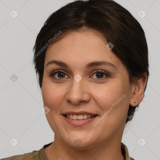 Joyful white young-adult female with medium  brown hair and brown eyes