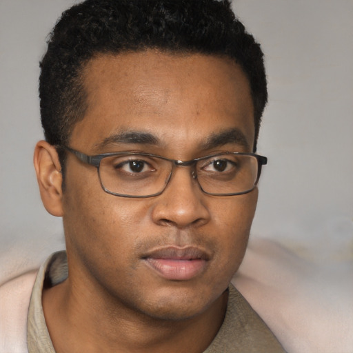 Neutral latino young-adult male with short  brown hair and brown eyes