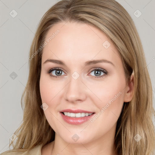 Joyful white young-adult female with long  brown hair and blue eyes