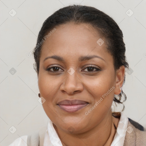 Joyful latino adult female with short  brown hair and brown eyes