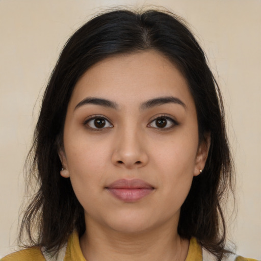 Neutral latino young-adult female with long  brown hair and brown eyes