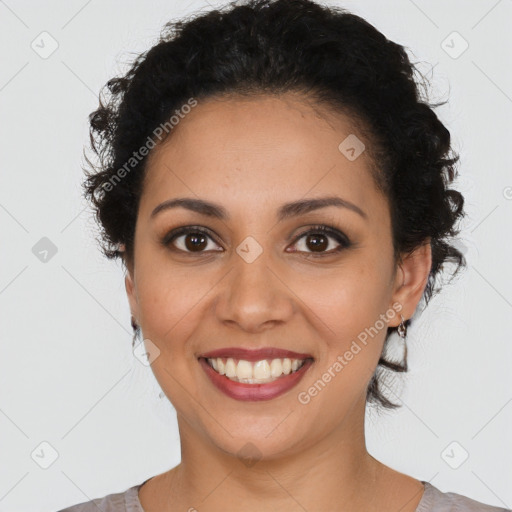 Joyful latino young-adult female with short  brown hair and brown eyes