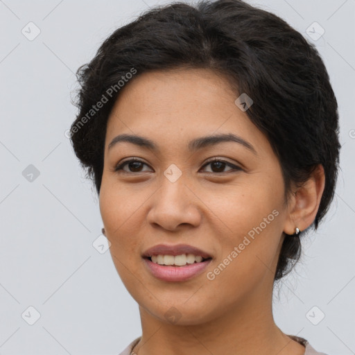 Joyful asian young-adult female with short  brown hair and brown eyes