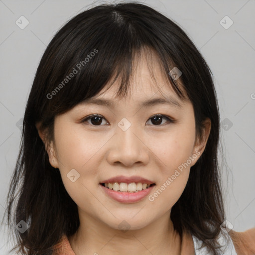 Joyful asian young-adult female with medium  brown hair and brown eyes