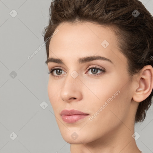 Neutral white young-adult female with medium  brown hair and brown eyes