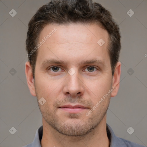 Neutral white young-adult male with short  brown hair and brown eyes