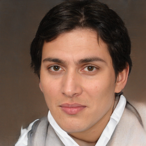 Joyful white young-adult male with medium  brown hair and brown eyes