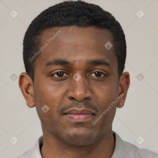 Neutral black young-adult male with short  black hair and brown eyes