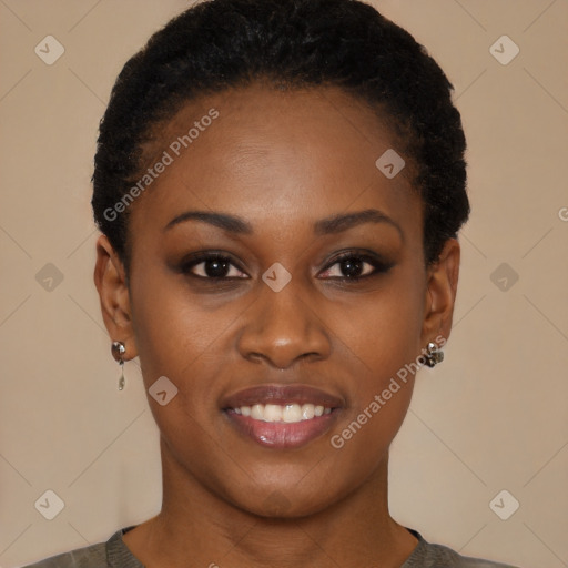 Joyful black young-adult female with short  black hair and brown eyes