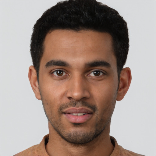 Neutral latino young-adult male with short  black hair and brown eyes