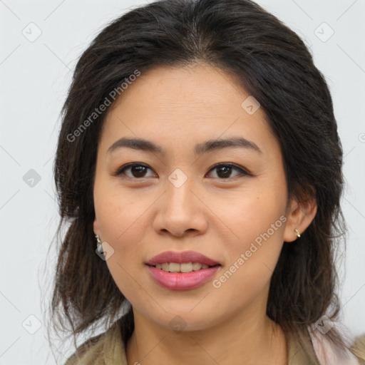 Joyful asian young-adult female with medium  brown hair and brown eyes