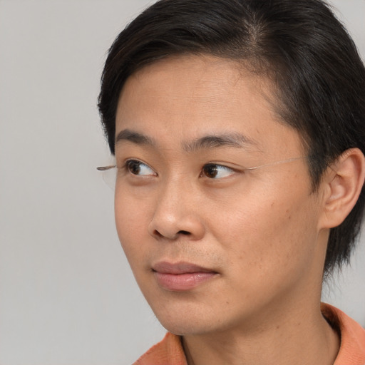 Neutral asian young-adult male with short  brown hair and brown eyes