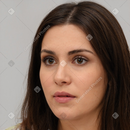 Neutral white young-adult female with long  brown hair and brown eyes