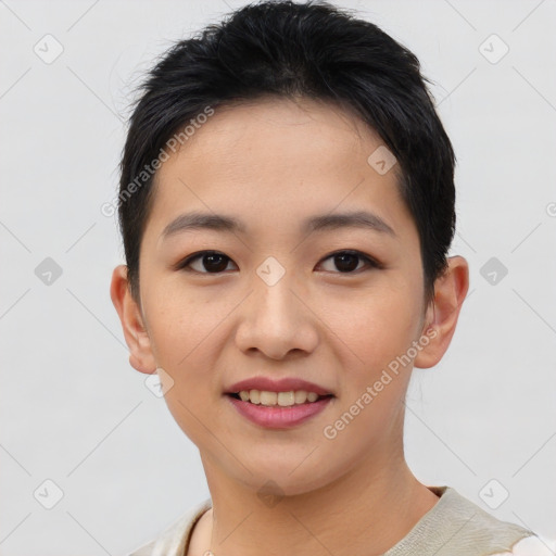 Joyful asian young-adult female with short  black hair and brown eyes