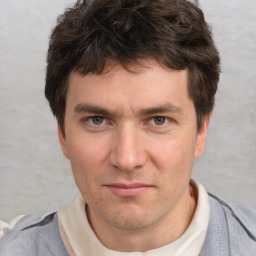 Neutral white adult male with short  brown hair and brown eyes