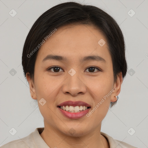 Joyful asian young-adult female with short  brown hair and brown eyes