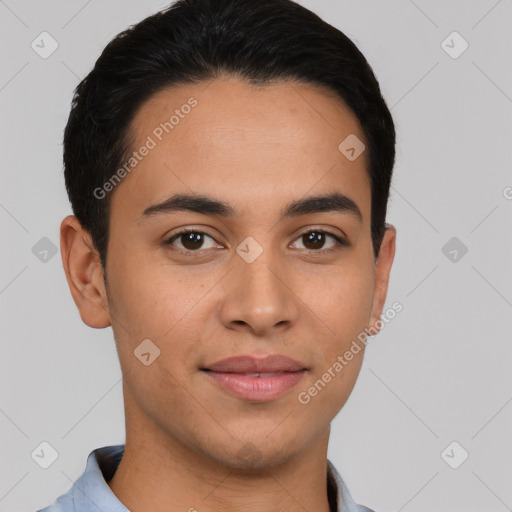 Joyful latino young-adult male with short  brown hair and brown eyes