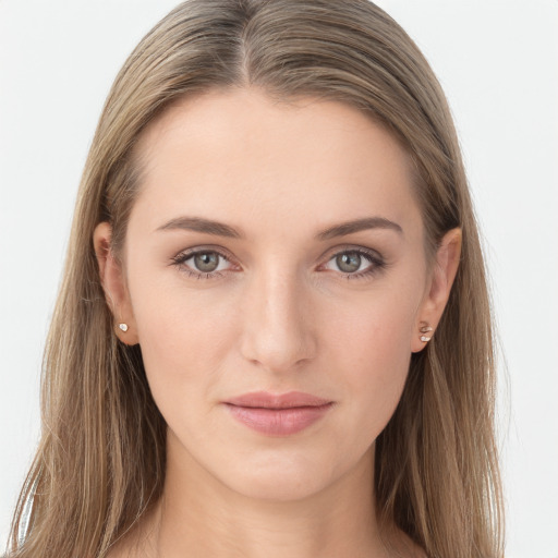 Joyful white young-adult female with long  brown hair and grey eyes