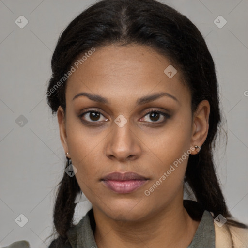 Neutral black young-adult female with medium  brown hair and brown eyes