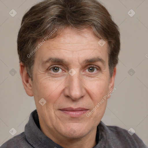 Joyful white adult male with short  brown hair and grey eyes