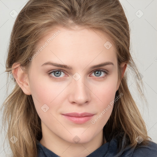 Joyful white young-adult female with medium  brown hair and blue eyes