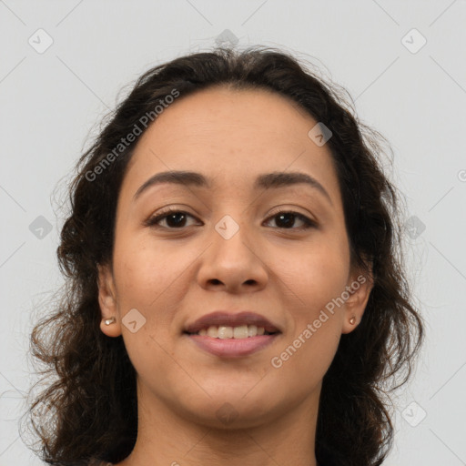 Joyful latino young-adult female with medium  brown hair and brown eyes