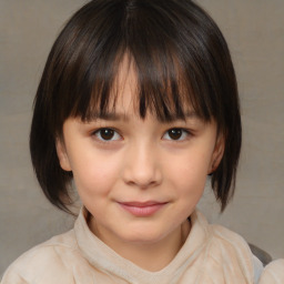 Joyful white child female with medium  brown hair and brown eyes