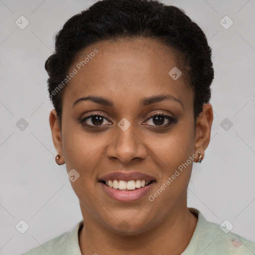 Joyful black young-adult female with short  brown hair and brown eyes