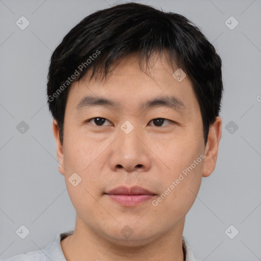 Neutral asian young-adult male with short  brown hair and brown eyes